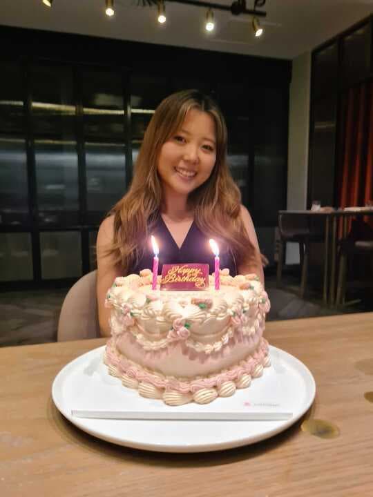 Jee with her heart-shaped birthday cake